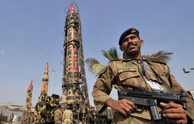 Pakistan soldiers proudly display their nuclear weapons