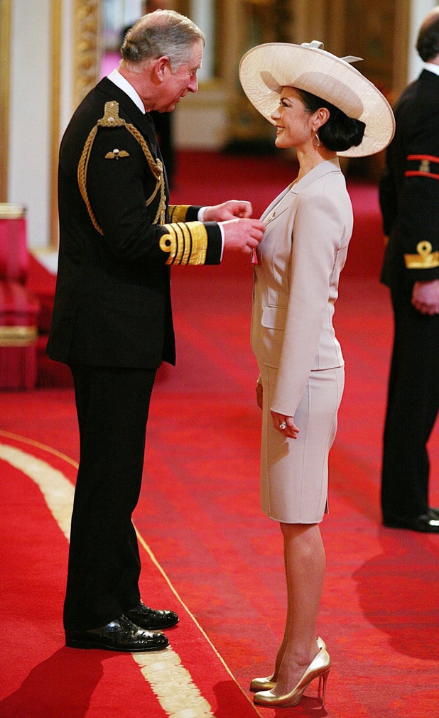 Prince Charles gives Catherine Zeta Jones her CBE